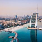 Burj,Al,Arab,Luxury,Hotel,And,Dubai,Marina,Skyline,In